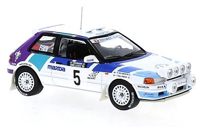 MAZDA 323 GTX No.5 T. SALONEN / V. SILANDER RALLYE 1000 LAKES 1990 WITH NIGHT LIGHTS